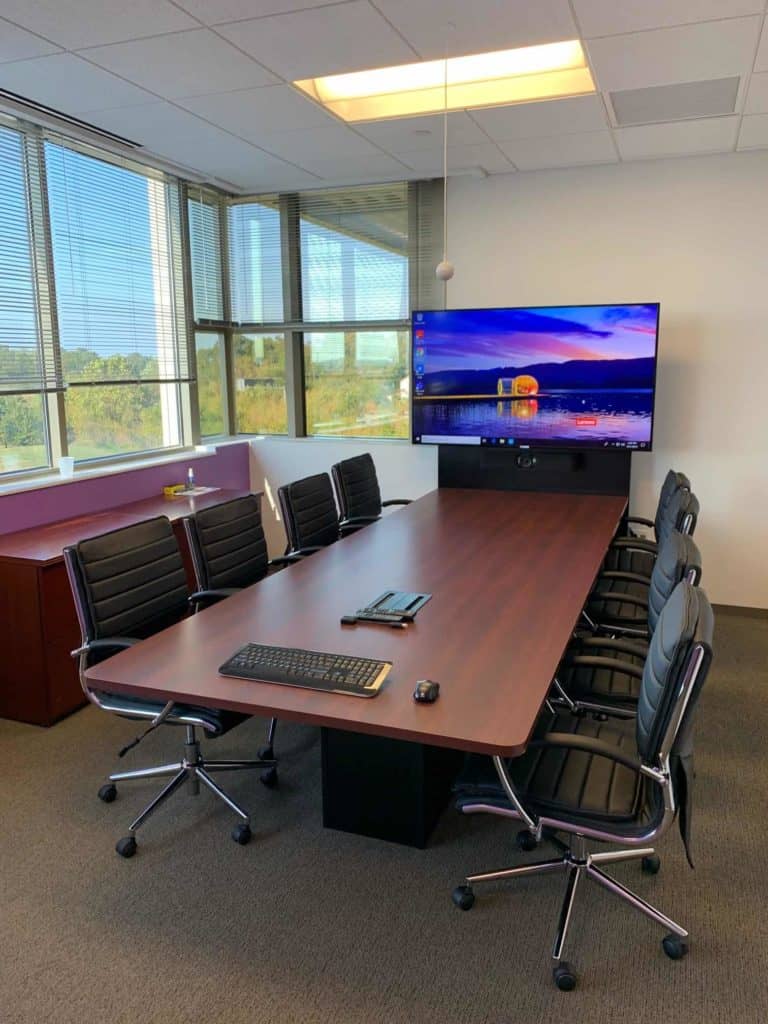 tv on wall in conference room