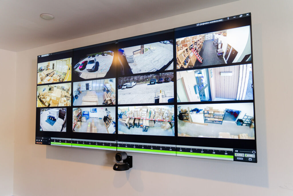 Monitor display security camera footage from multiple cameras