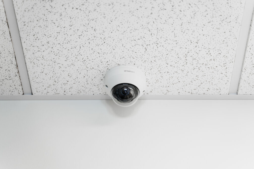 Overhead security camera inside of a business