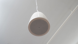 Image of a speaker hanging from ceiling